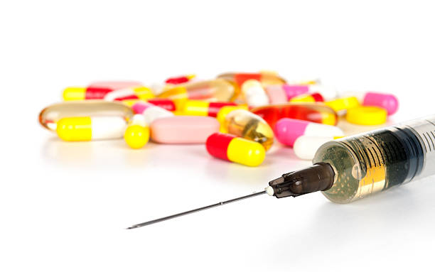 istock preparation in pill and capsule with syringe 164237353