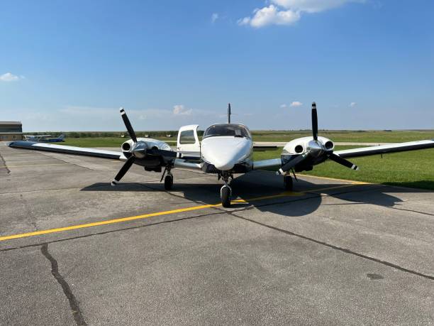 istock A white and blue plane is parked and ready to fly. 1642375085