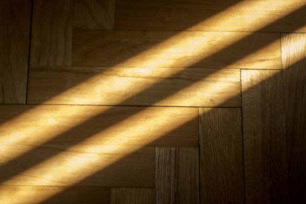 istock Sunbeams on the parquet 1642381210