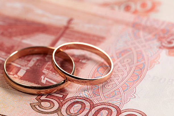 Wedding rings on money