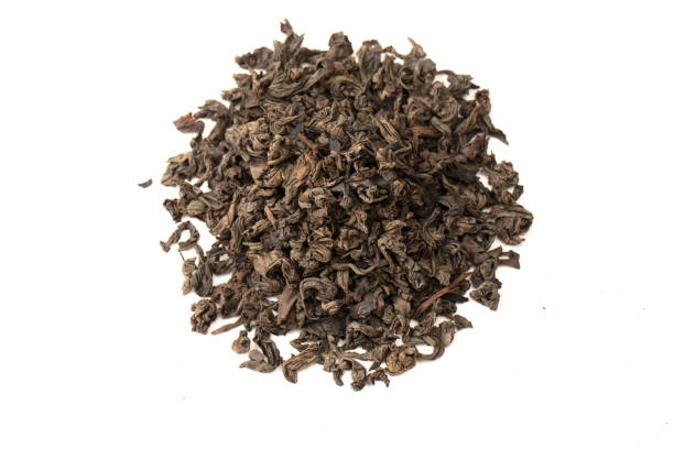 istock Dried tea leaves isolated on a white background. 1642395168