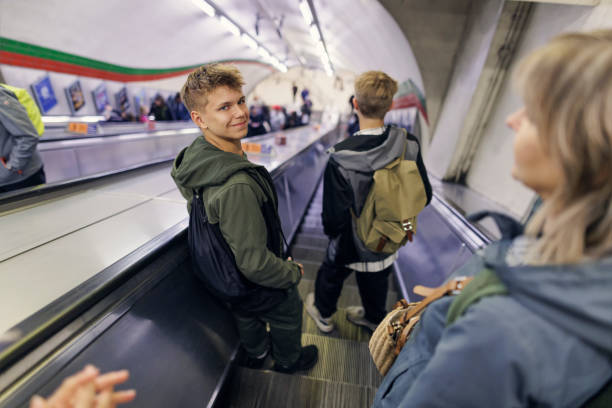 istock Family travelling in London Underground escalator 1642400969