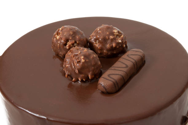 istock A delicious Ferrero Rocher cake, isolated on white background. 1642417561