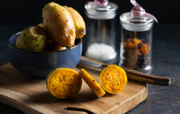 Freshly harvested prickly pears. The prickly pear is the fruit of the nopales cactus, the fruit has a delicious juice and lots of vitamins and minerals. fico d'india stock pictures, royalty-free photos & images