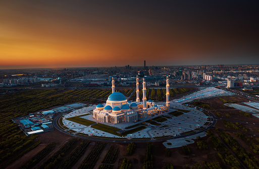 Aerial view of The Grand Mosque of Astana in Kazakhstan during beautiful sunset. It is the largest mosque in Central Asia and one of the largest in the world