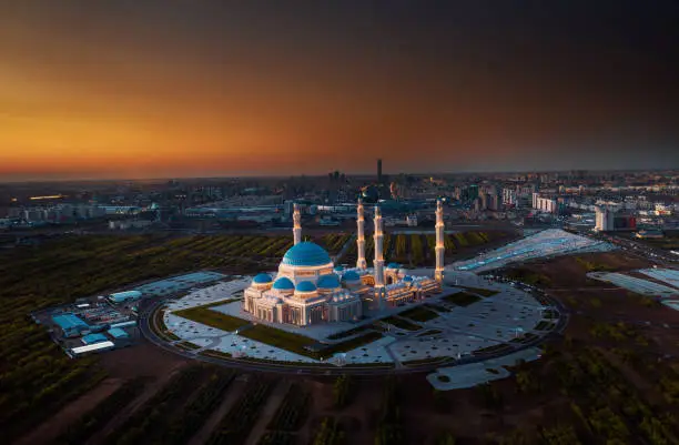 Aerial view of The Grand Mosque of Astana in Kazakhstan during beautiful sunset. It is the largest mosque in Central Asia and one of the largest in the world