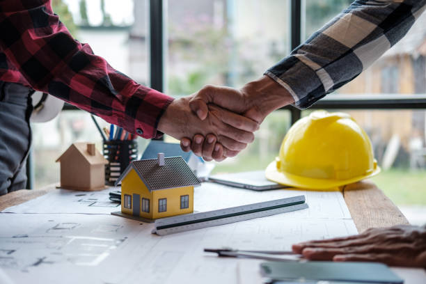 istock Foreman or Civil engineer handshake making modern construction. industry professional team and engineer concept 1642467080