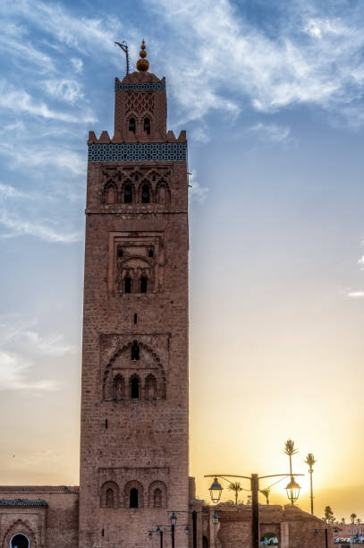 istock Koutoubia Mosque Tower in Marrakech at sunset, Morocco, blue sky background 1642484872