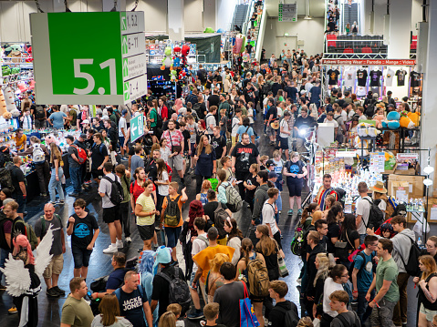 COLOGNE - AUG 26, 2023: Crowds of Visitors in Hall 5.1 at Gamescom 2023 in Cologne