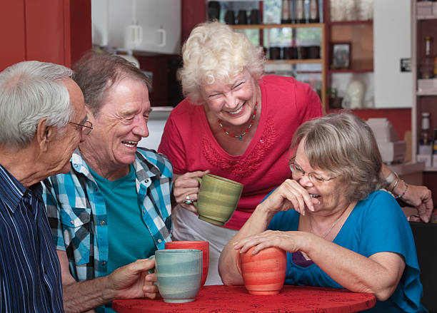 istock Laughing Friends in Coffeehouse 164249713