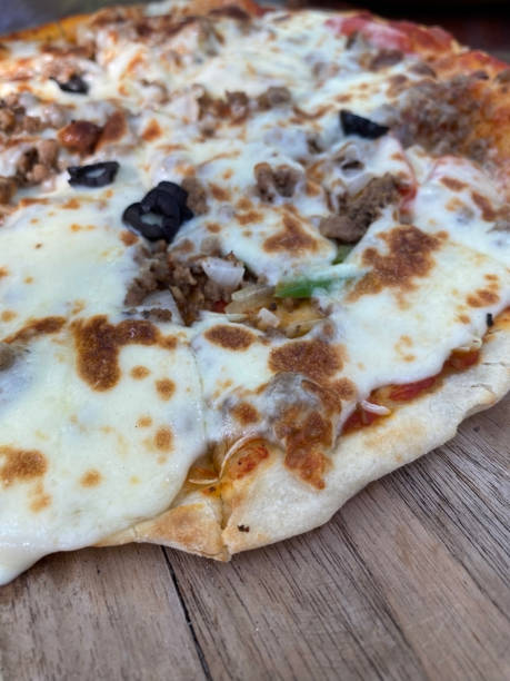 istock Close up of the pizza from which is on the table 1642517927