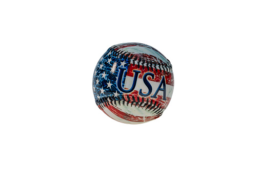 Close-up view of souvenir baseball with image of American flag isolated on white background.