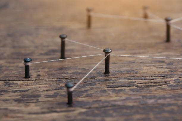 Network connected with yarn white on plank wood
