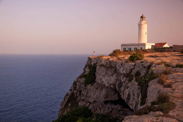 Lighthouse of La Mola in Formentera island The Lighthouse of La Mola is one of three ligthhouses of the island of Formentera. formentera island stock pictures, royalty-free photos & images