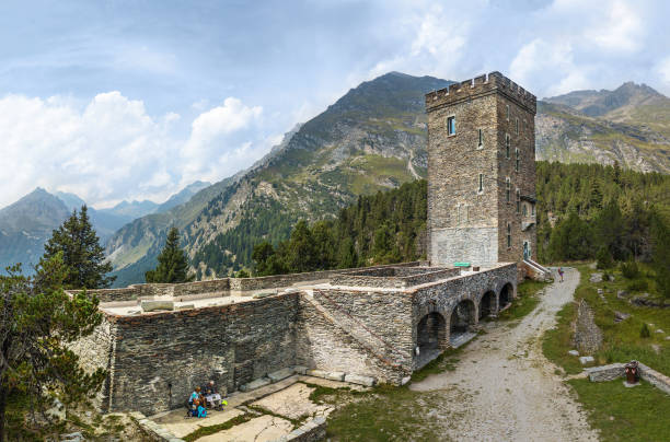 tower of belvedere - an old castle restored at the maloja pass height - castle engadine alps lake water imagens e fotografias de stock