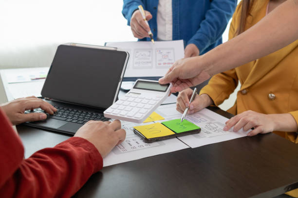 istock team of UI UX web designer are working together to develop mobile responsive websites with UI UX front end designer previews, UI UX web development ideas, front end designer. application development 1642649273