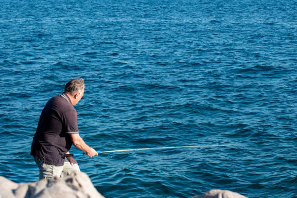 istock Senior man fishing 1642652550