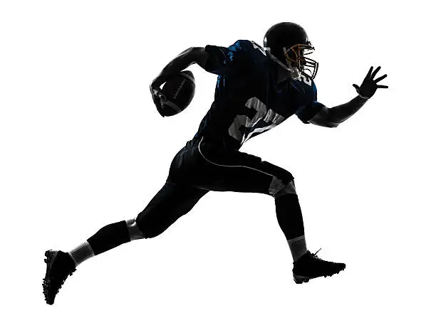 Photo of american football player man running silhouette