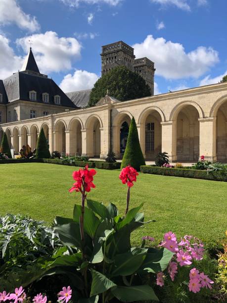 istock Flowers, public park and stone monument, in Normandy 1642663775