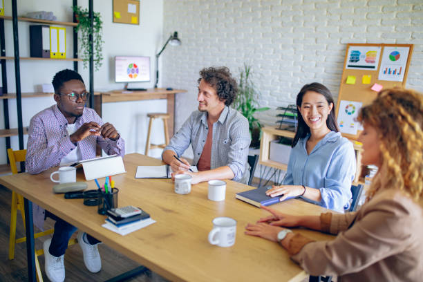 istock Colleagues working together at the office 1642748486