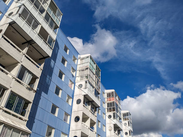 istock Low angle view of building against cloudy sky 1642757052
