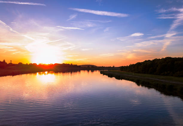 istock Sunset with a colourful sky over the river 1642777176