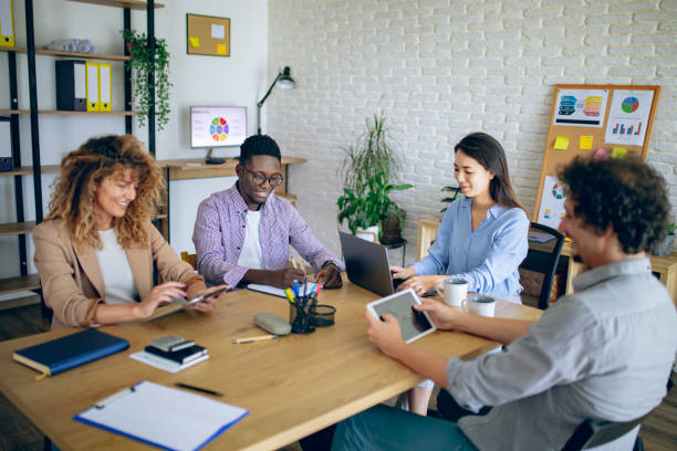istock Colleagues having team meeting at modern office 1642788850