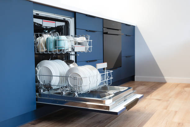 istock Dishwasher in modern kitchen. Washing dishes 1642792493