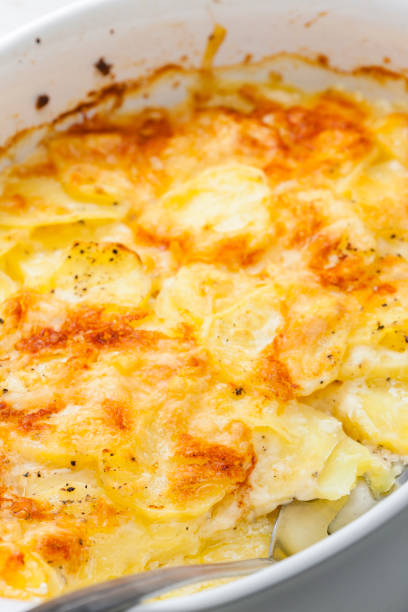 istock still ife of baked potatoes with cheese 1642844761