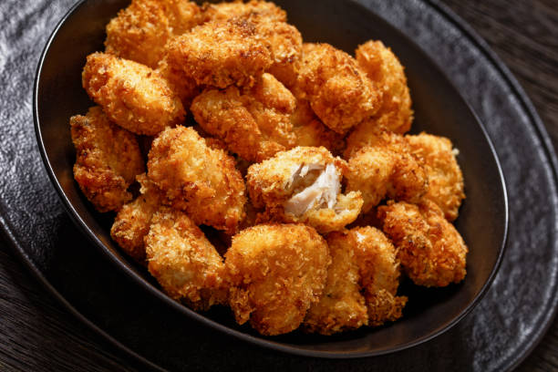istock crispy fried panko breaded chicken bites in bowl 1642891244