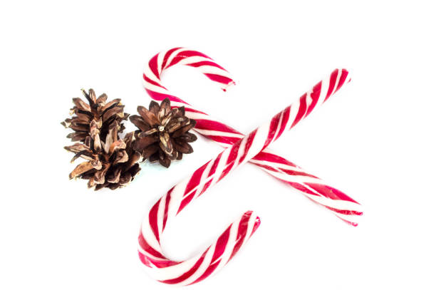 istock Christmas candy canes on white background 1642913359