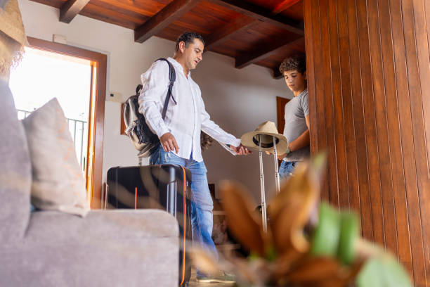 istock Dad and son chatting before leaving for a trip 1642918188