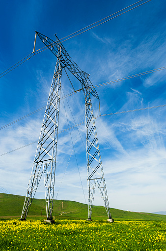 High voltage pole or High voltage electricity tower and transmission power lines.