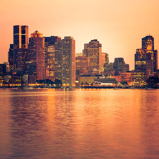 Boston, MA, USA  May 5 A view from a ferry leaving a slip in Boston Harbor offers a view of the city skyline