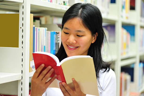 istock adult student reading in library 164297982