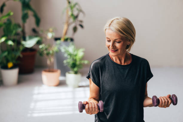 istock A Happy Blonde Senior Woman Looking Away While Doing Her Daily Workout 1643002499
