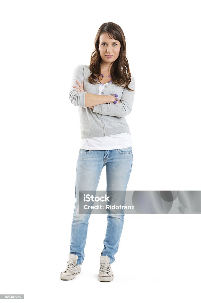 A portrait of a happy woman wearing a jeans Young Happy Woman Isolated On White Background. Teenager Stock Photo