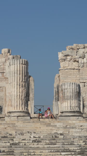 4k video of mother, son and daughter in ancient Greek city ruins