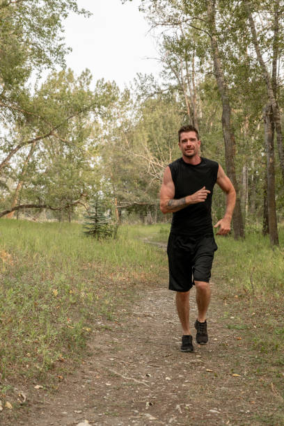 istock Running in a city nature park 1643179647