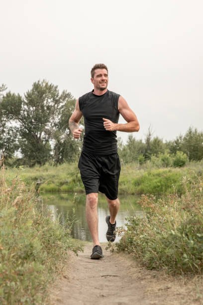 istock Running in a city nature park 1643187337