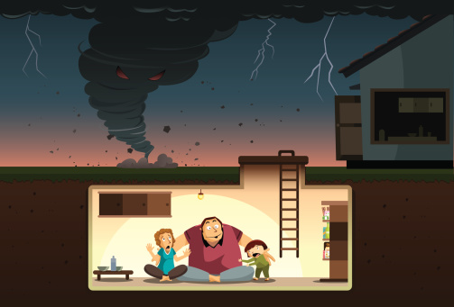 A family hiding from the raging tornado inside an underground bunker.