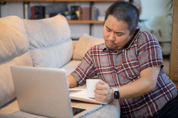 istock Young fashionable man working at home 1643253708
