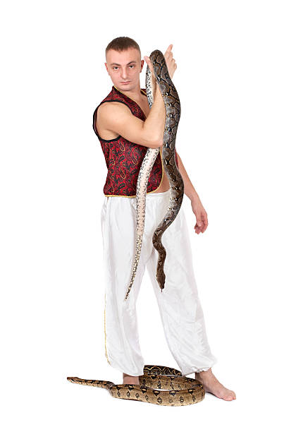 istock Young Caucasian Man with snakes 164326381