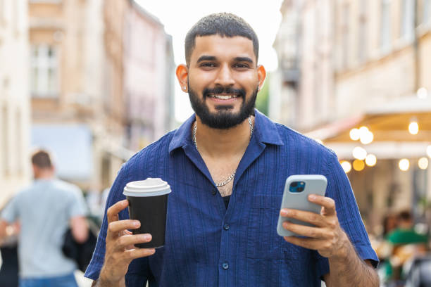 istock Young adult man use smartphone typing text messages browsing internet finishing work chatting online 1643264262