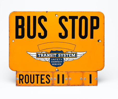 A vintage porcelain sign from a generic transit system.