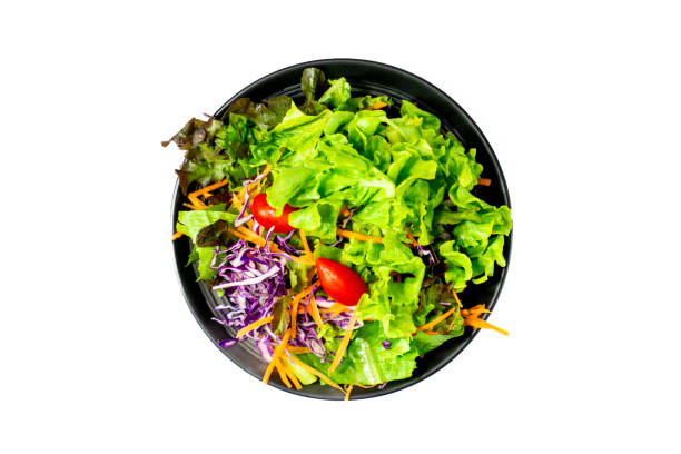 istock Isolated on white, a black-bowl salad. 1643323868