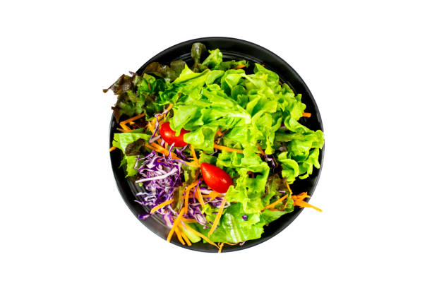 istock Isolated on white, a black-bowl salad. 1643323884