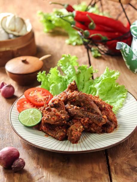 istock Pelecingan ayam,  chicken with a special spicy seasoning 1643334896