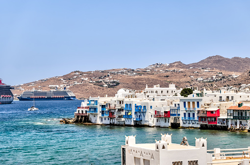 Mykonos, Greece - July 21, 2023: The iconic Little Venice waterfront buildings along the shores of Mykonos Town in Greece