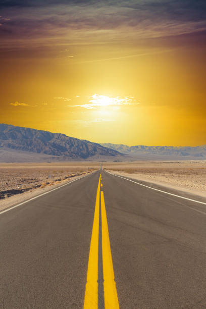 istock An empty road running straight through Death Valley 1643335428